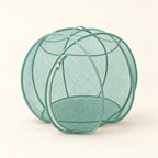 Mint Foldable Cat Explorer Sphere with mint mesh and trim, pale zip and gold zipper pull.