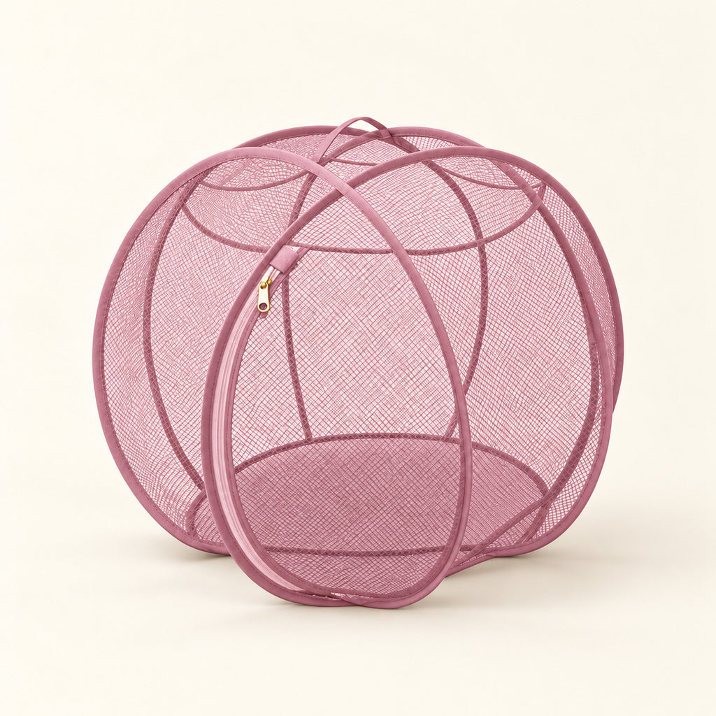 Pink Foldable Cat Explorer Sphere with dusty pink mesh and trim and gold zipper pull.